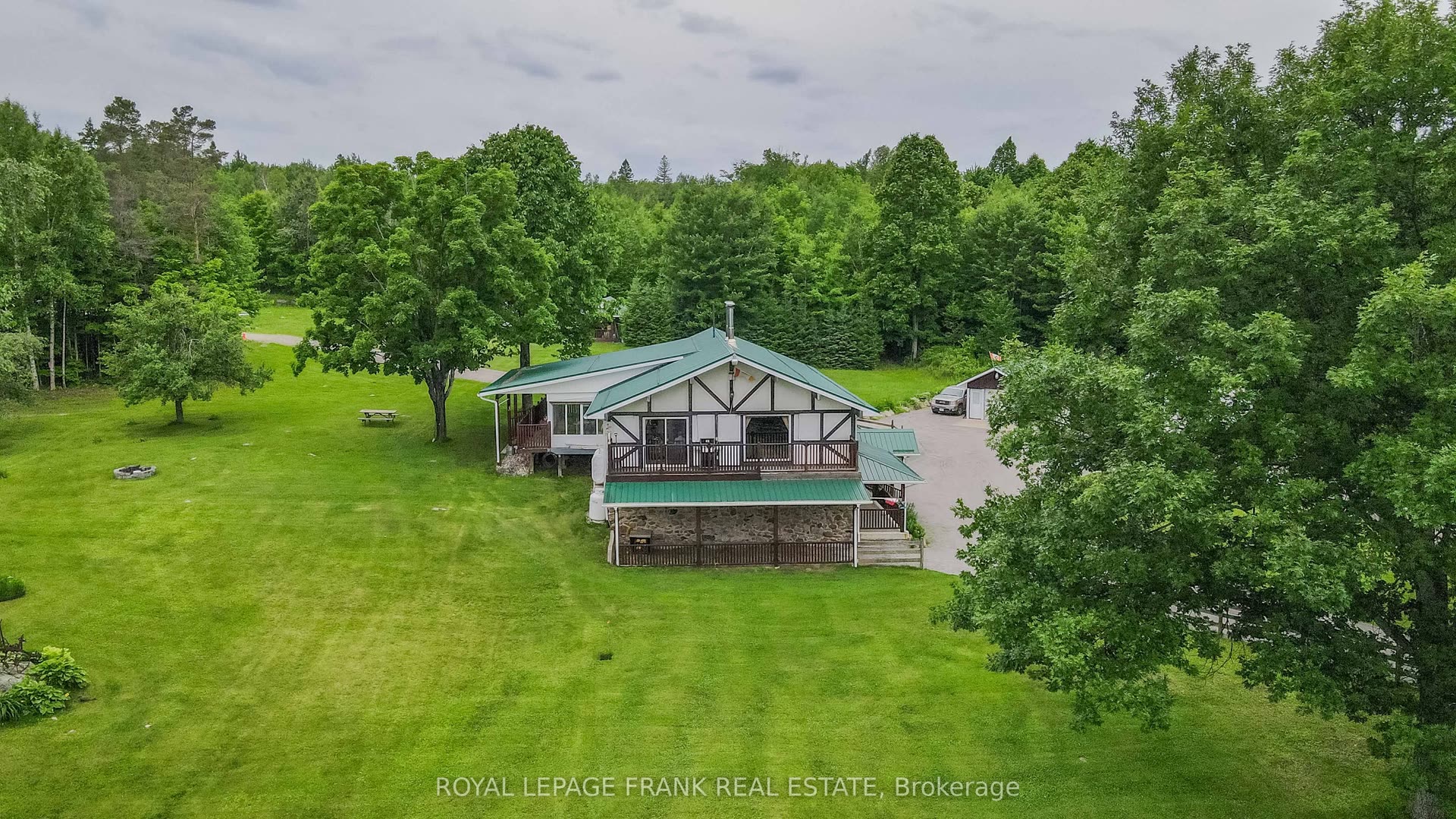 Aerial view of 497 Mooney Road homestead on 141 acres